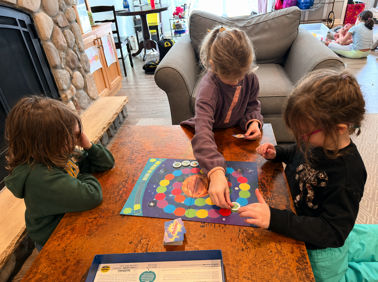 Child engaged in a hands-on learning activity at the Creative Kids Zone